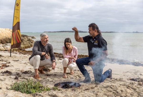 Smoking ceremony on the beach, In Culture Tours, Cape Peron, Western Australia © Tourism Australia