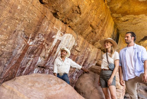 Group at Magnificent gallery during Jarramali Rock Art Tour, in Laura, Cook, Queensland © Tourism Australia
