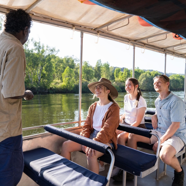 Guide talking to a group of people on the Guluyambi Cultural Cruise, Kakadu Cultural Tours, Top End, Northern Territory © Tourism Australia