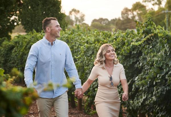 Couple walking through The Colony at Mandoon Estate, Caversham, Swan Valley, Western Australia © Mandoon Estate