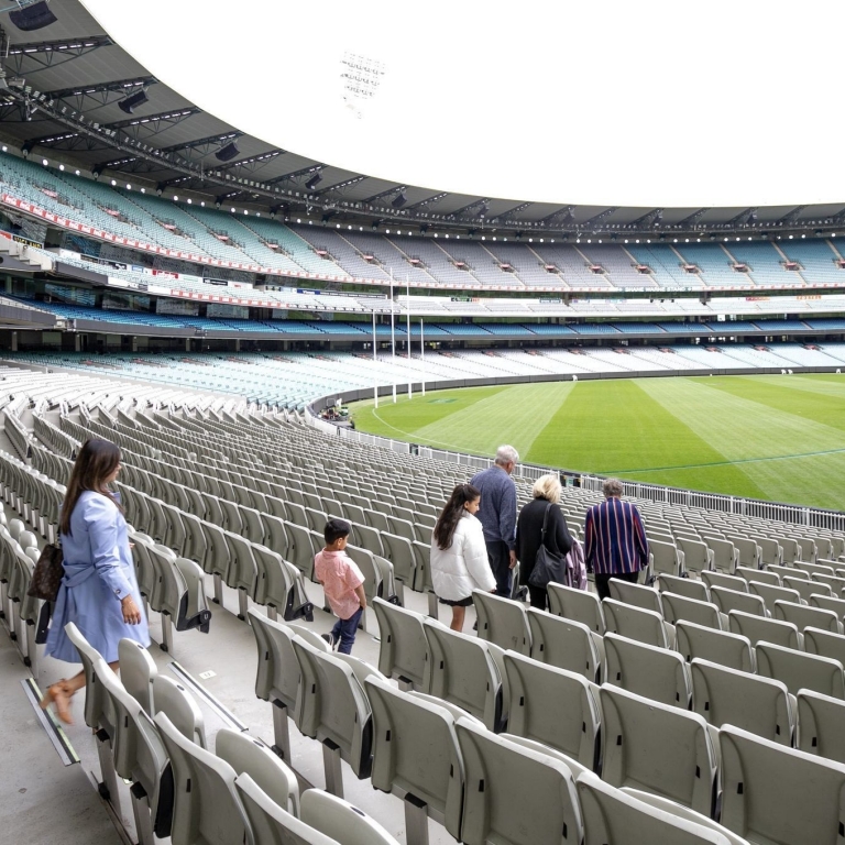 Family on a tour of the Melbourne Cricket Ground, East Melbourne, Melbourne, Victoria © Tourism Australia