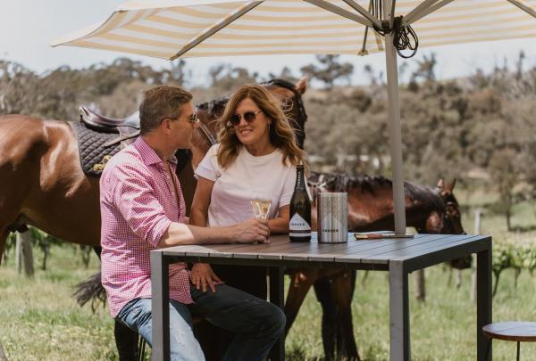 Couple outdoor dining at Petaluma, Adelaide Hills, South Australia © Petaluma