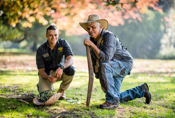Two men kneeling in the Royal Botanic Gardens Melbourne, Melbourne, Victoria © Visit Victoria