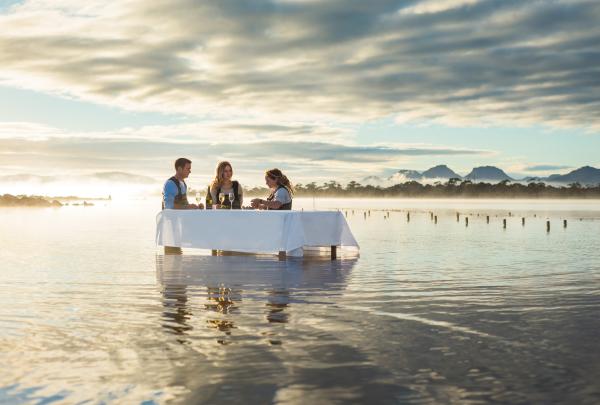 The Saffire Freycinet Marine Oyster Farm Experience allows you to don a pair of waders and visit a working oyster farm, Freycinet, Tasmania © Saffire Freycinet