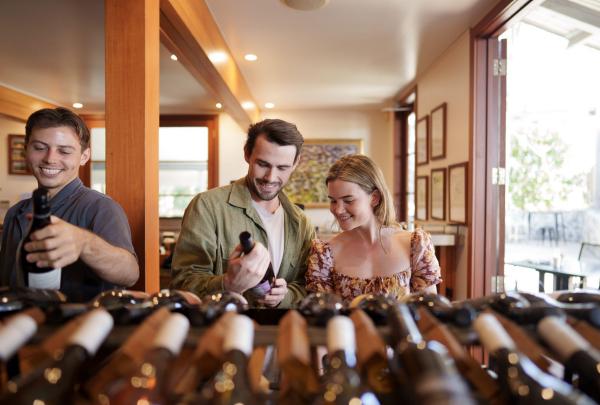 People perusing the wines at Sirromet, Mount Cotton, Brisbane, Queensland © Tourism Australia