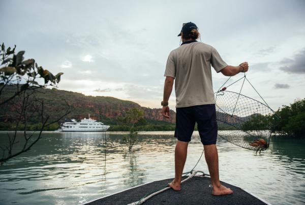 Catching mud crabs in the Hunter River, True North, The Kimberley, Western Australia © True North