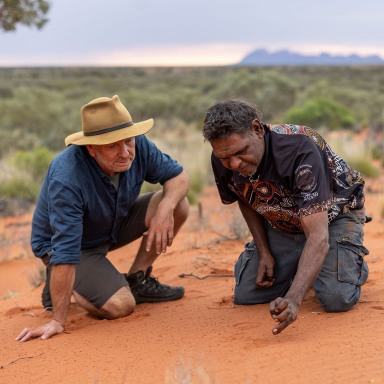 Guide Heath Garratt with Anangu, Uluṟu Kata Tjuṯa Signature Walk, Uluṟu Kata Tjuṯa National Park, Northern Territory © Tasmanian Walking Company
