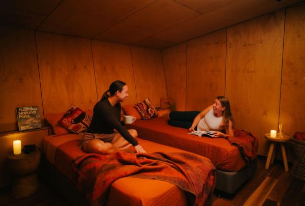 Two women enjoying the luxury lodge accommodation, Uluṟu Kata Tjuṯa Signature Walk, Uluṟu Kata Tjuṯa National Park, Northern Territory © Michael Peters