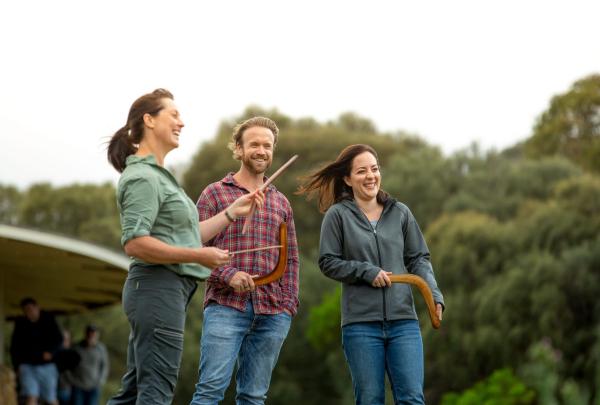 Group taking part in boomerang activity at Worn Gundidj @ Tower Hill, Great Ocean Road, Victoria © Tourism Australia
