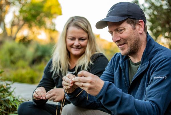 Guests on wukalina Walk can take part in various cultural activities such as weaving, Bay of Fires, Tasmania © Jillian Mundy & Tourism Australia