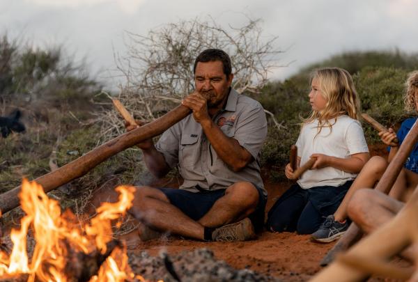 Guide playing Didgeridoo, Wula Gura Nyinda Eco Cultural Adventures, Shark Bay, Western Australia © Tourism Australia
